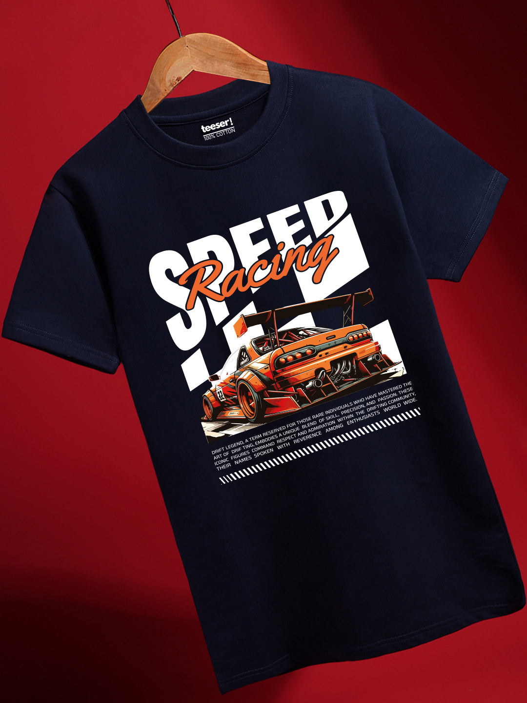 A navy blue t-shirt with a graphic print of a car and the text 'SPEED Racing' displayed on a red background.